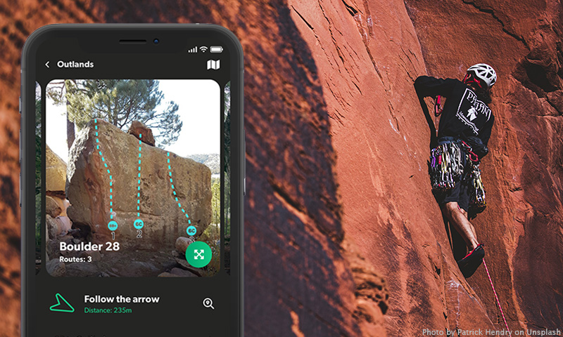 Topoguru app with a man climbing a rock in the background